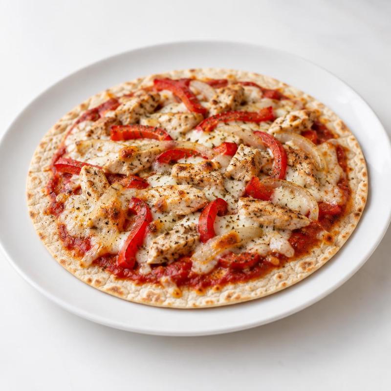 Chrupiąca tortilla zapiekana z kurczakiem, papryką i mozzarellą