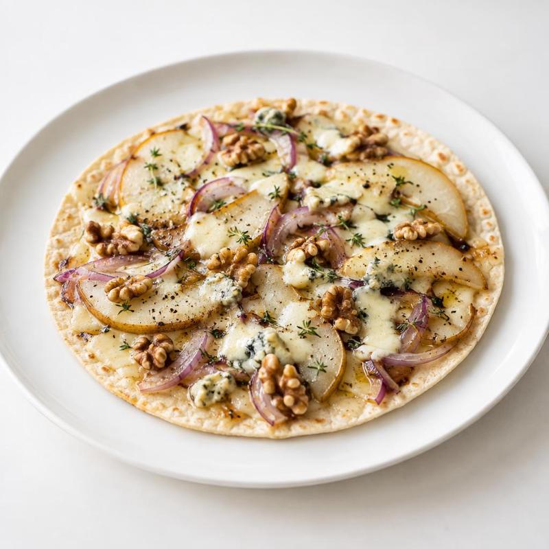 Tortilla zapiekana z gruszką, gorgonzolą, cebulą i orzechami